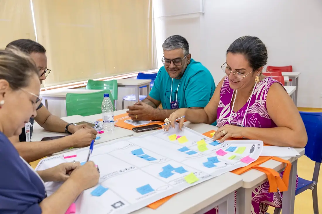 Participantes em workshop colaborativo no 16º SGPL (2023).